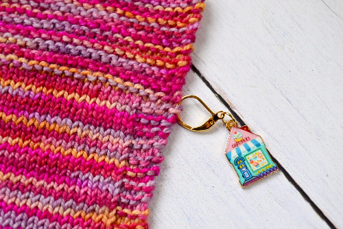 classic stitch marker cupcake attached to knitting